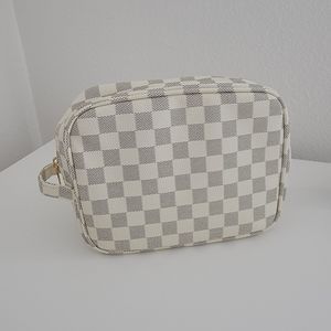 White/blue checkered print make up bag